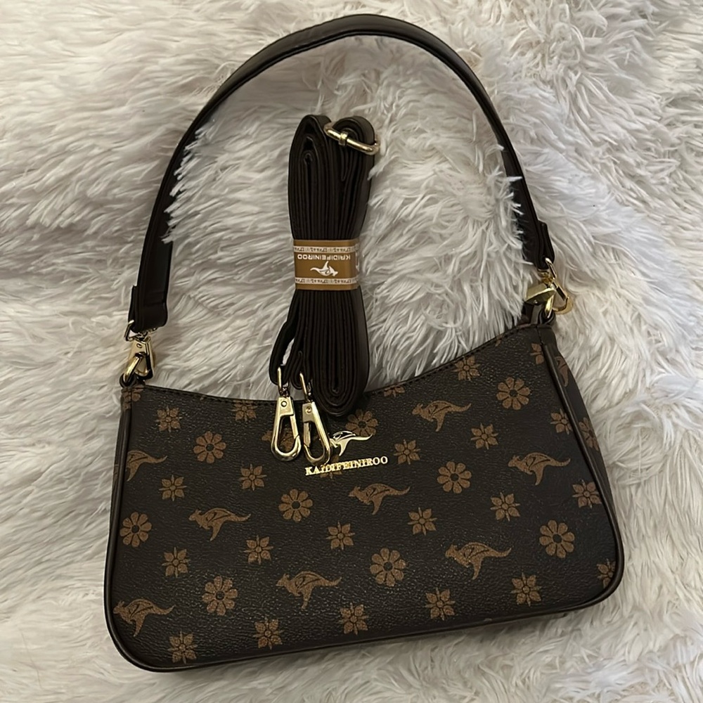 Woman’s hand & Crossbody  bag